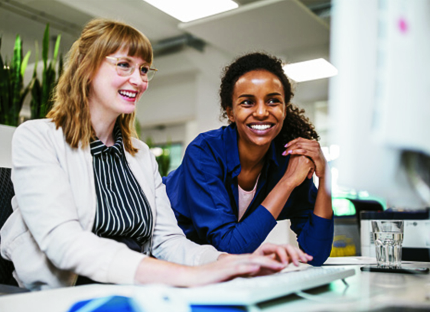 2 people looking at computer