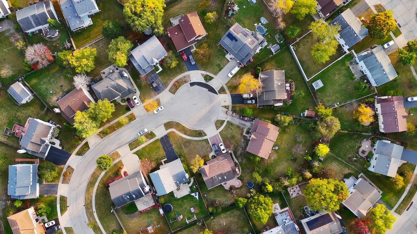 Aerial view of suburban neighborhood served by municipal government SaaS platform